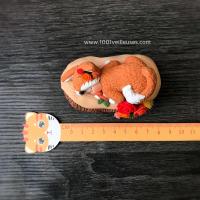 Customizable baby fox cake topper on wooden log