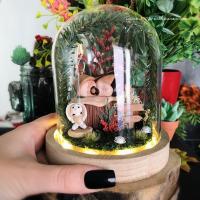 Enchanted LED bell in glass dome with a hand-carved baby boy in a personalized miniature garden with birth elements