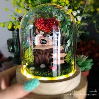 Enchanted LED bell in a glass dome with a hand-carved baby cow in a personalized miniature garden with birth elements