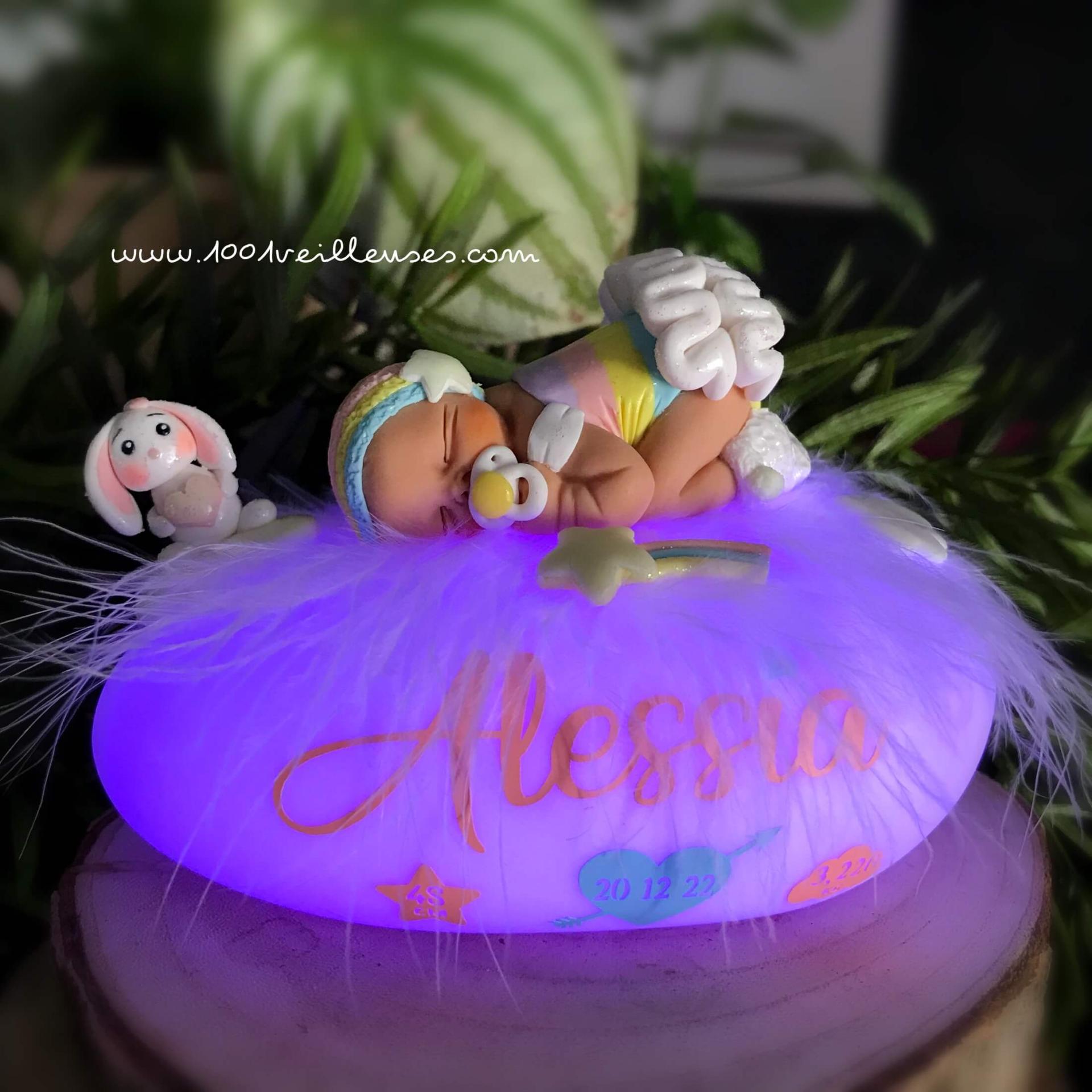 Night light lit with a handmade baby, dressed in rainbow colors, personalized with the name