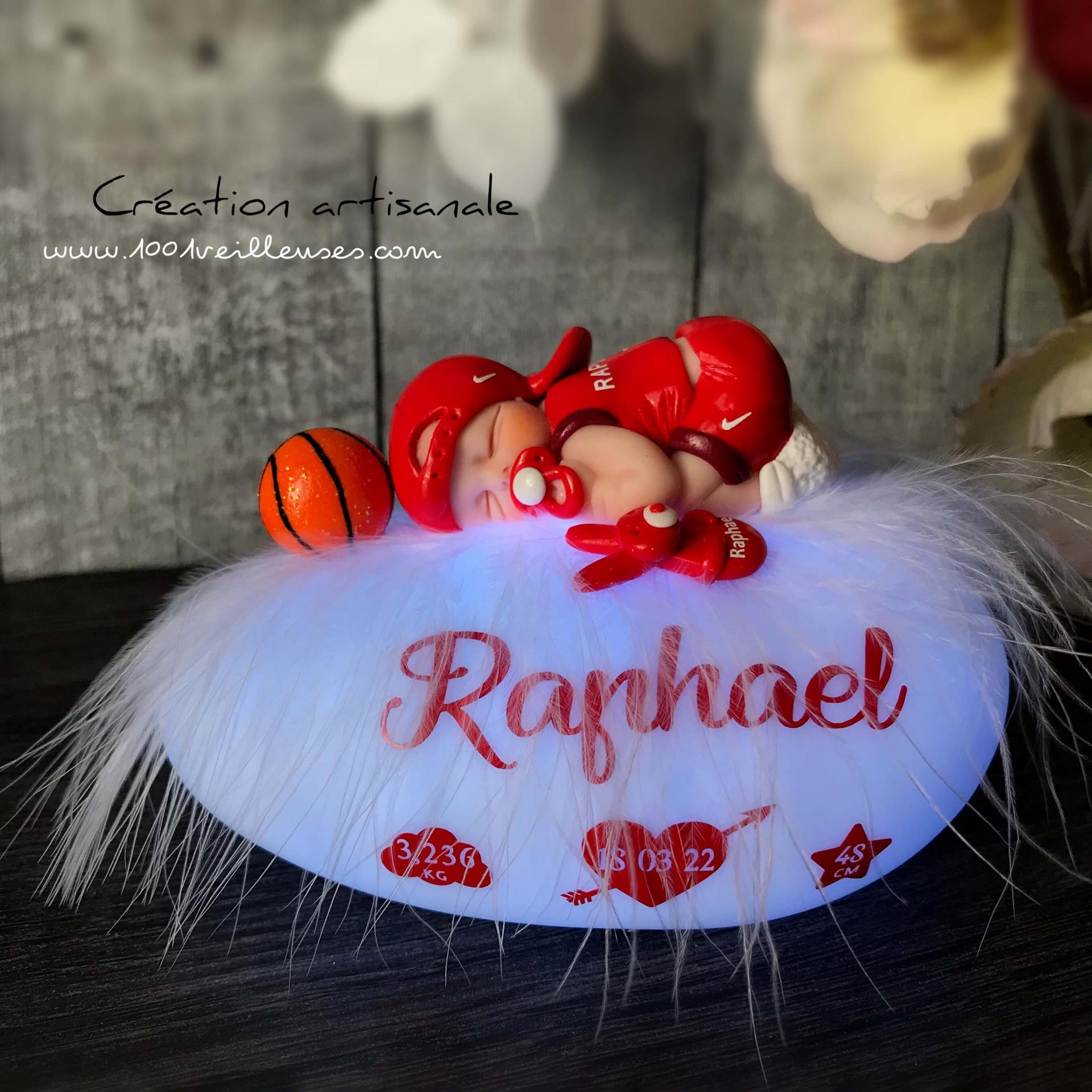 Handcrafted illuminated baby boy night light made from polymer clay with a basketball theme, featuring a customized jersey and accompanied by a stuffed animal