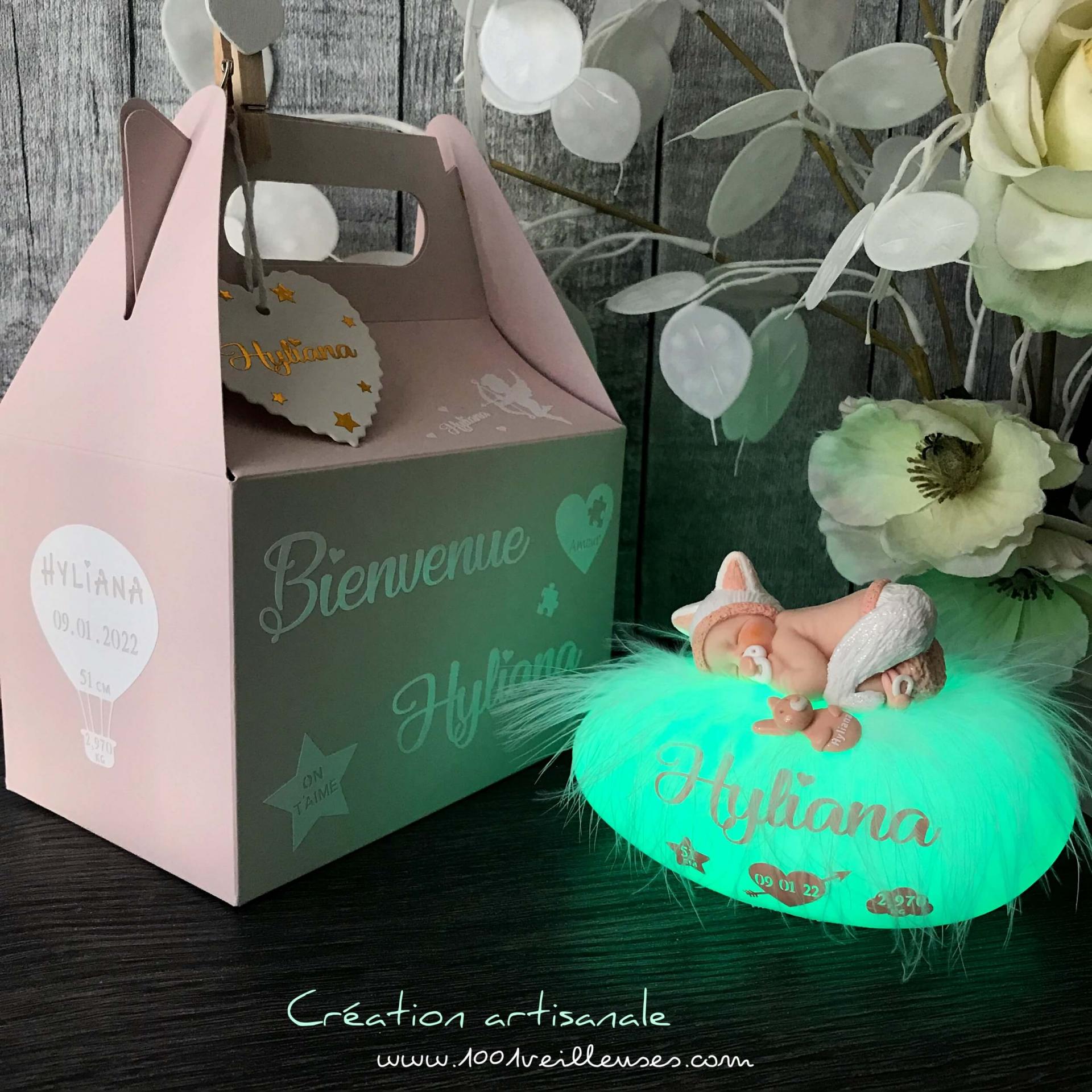 Handmade baby kitten night light with a fimo baby disguised as a cat, with its customizable gift box featuring the child's name, angled view