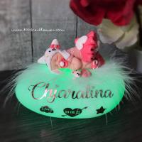 Lit nightlight with a handmade baby, dressed in Hello Kitty colors, personalized with the name