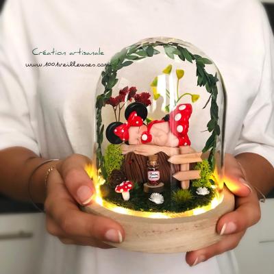 Handcrafted enchanted nightlight lit up with a baby Minnie in her beautiful miniature garden